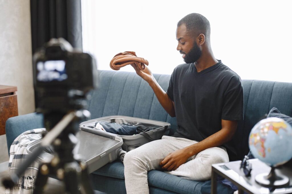 African Male Blogger Recording Vlog On Digital Cam 2024 12 07 01 23 18 Utc 1024x682