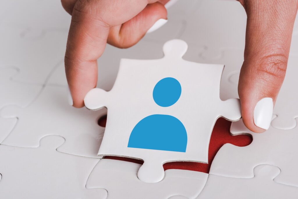 Close Up Of Woman Holding White Jigsaw With Blue H 2024 11 19 09 48 22 Utc 1024x684