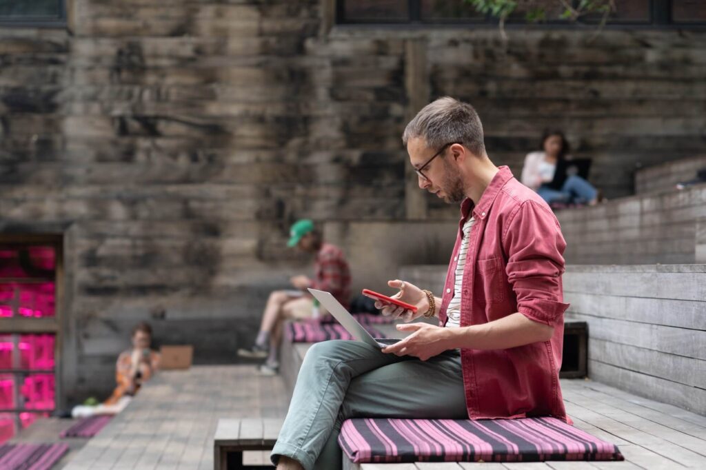 Focused Ui Ux Designer Looking At Smartphone Scree 2025 03 08 17 23 27 Utc 1024x682