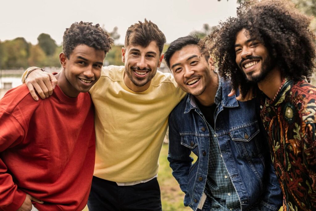 Four Happy Male Friends Embracing In A Park 2025 08 27 04 20 30 Utc 1024x682
