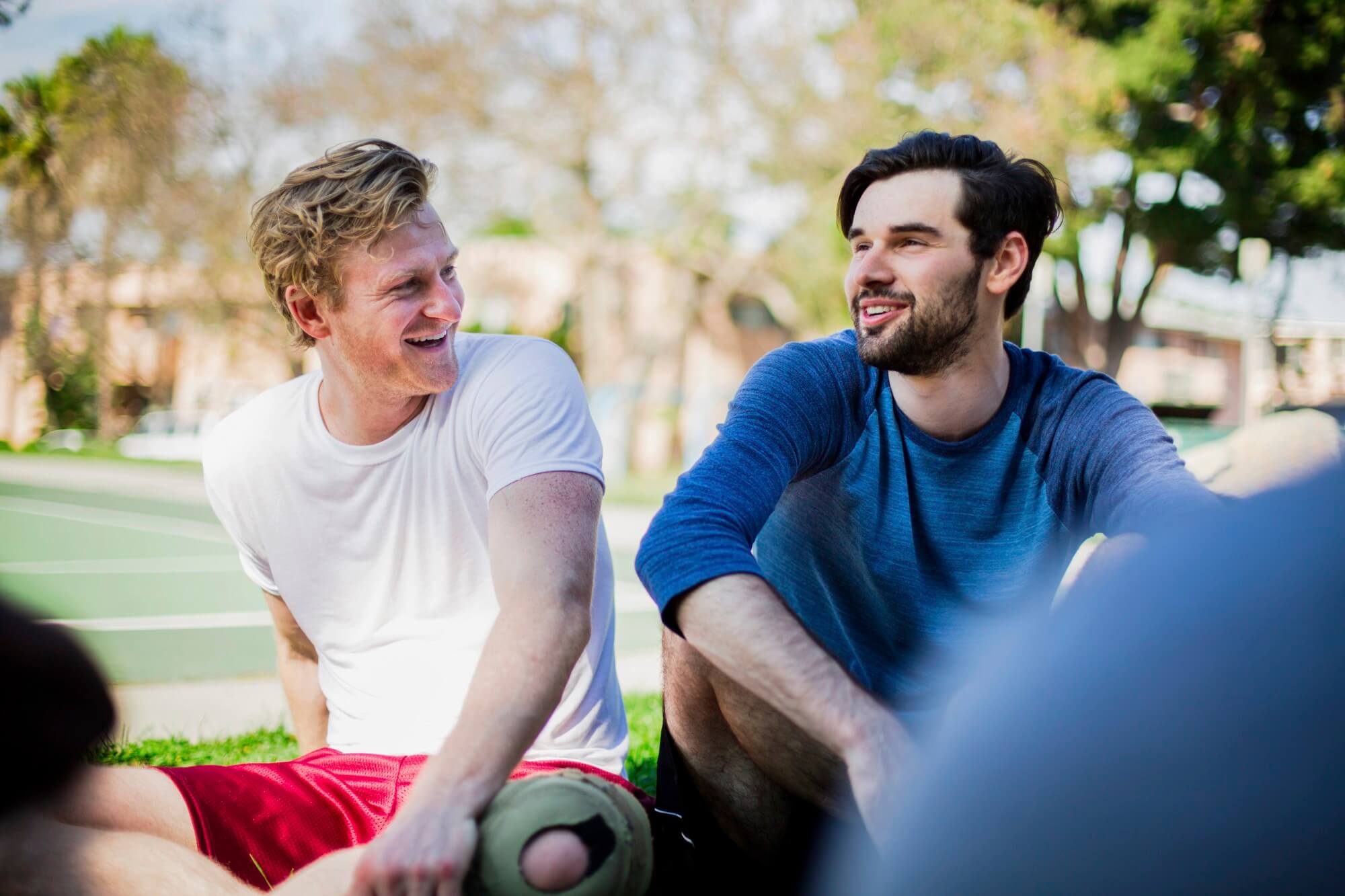 Group Of Male Friends Sitting Together In Park La 2025 04 04 05 00 41 Utc