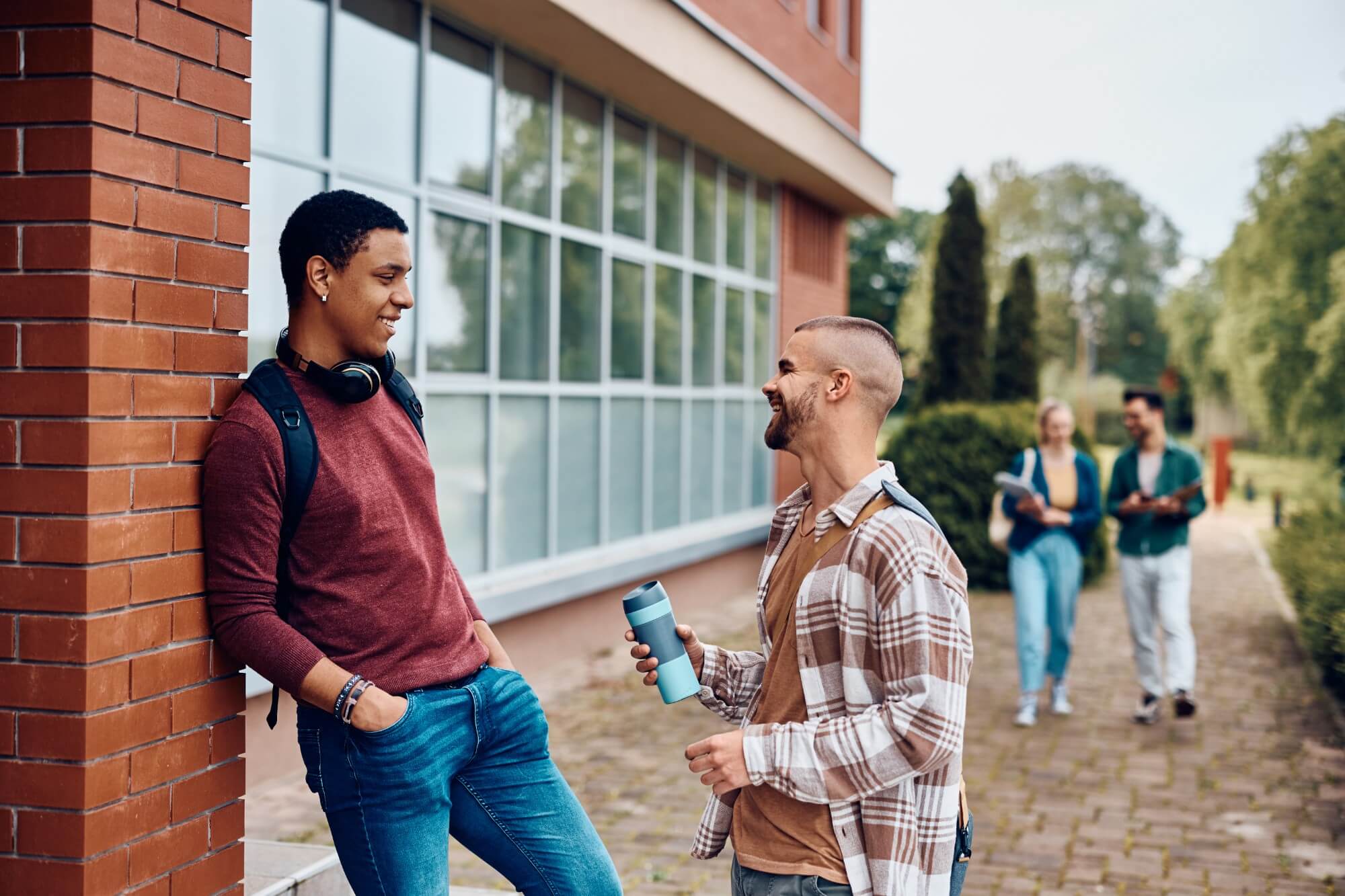 Happy Male Students Talking In Front Of University 2024 12 13 18 16 55 Utc