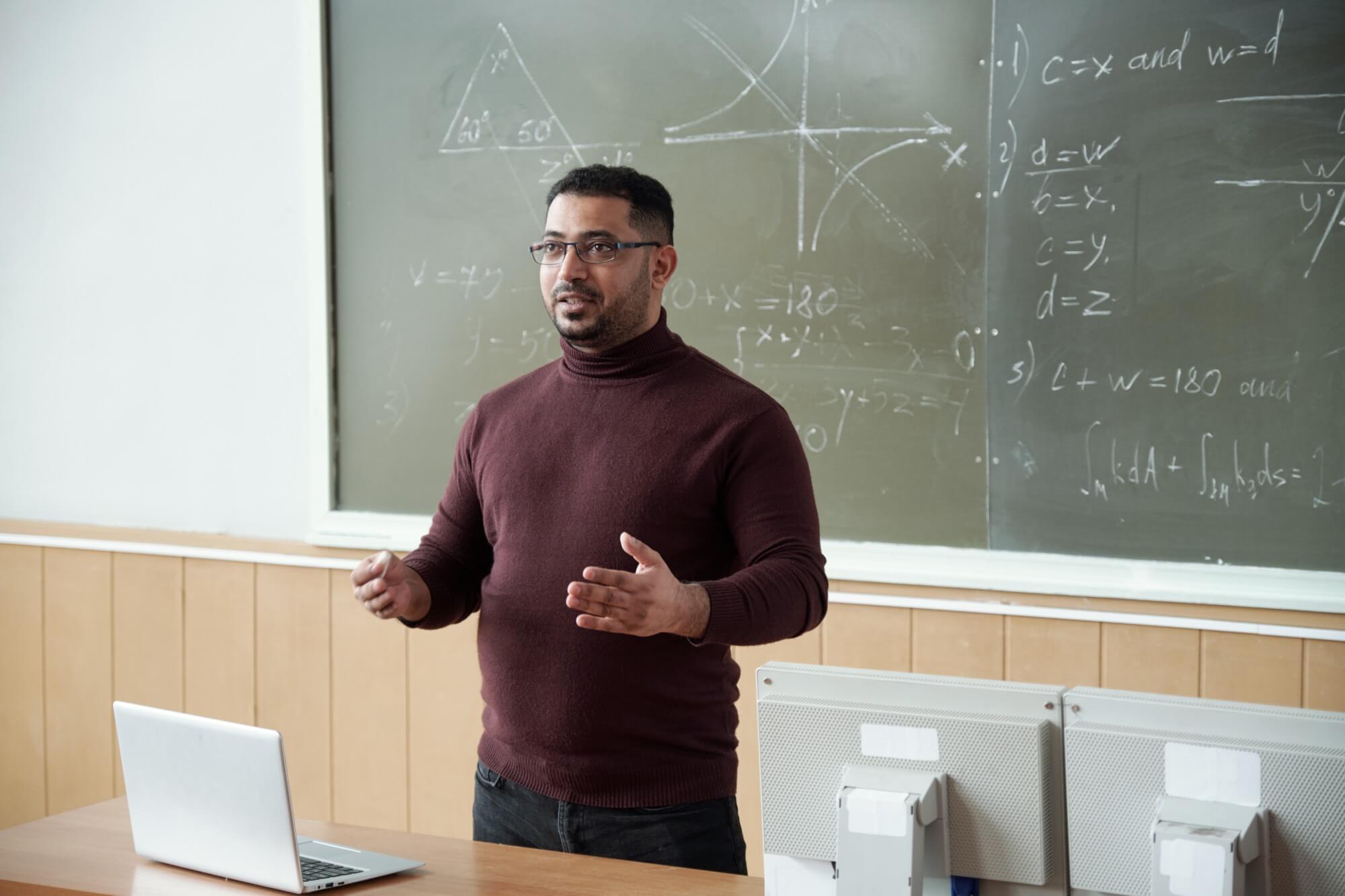 Mixed Race Man Explaining Something To Students 2025 03 13 23 20 41 Utc