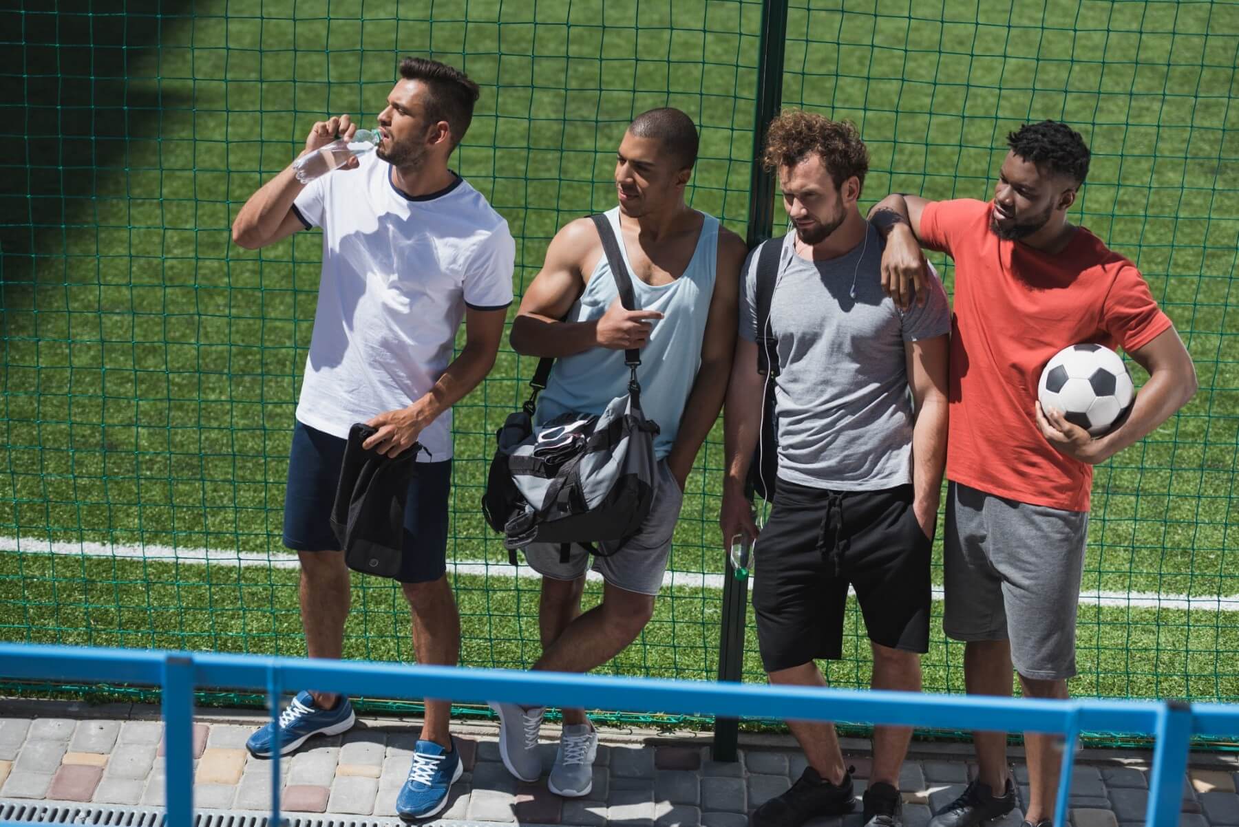 Multicultural Soccer Team Resting On Stadium Toget 2024 11 08 22 05 06 Utc