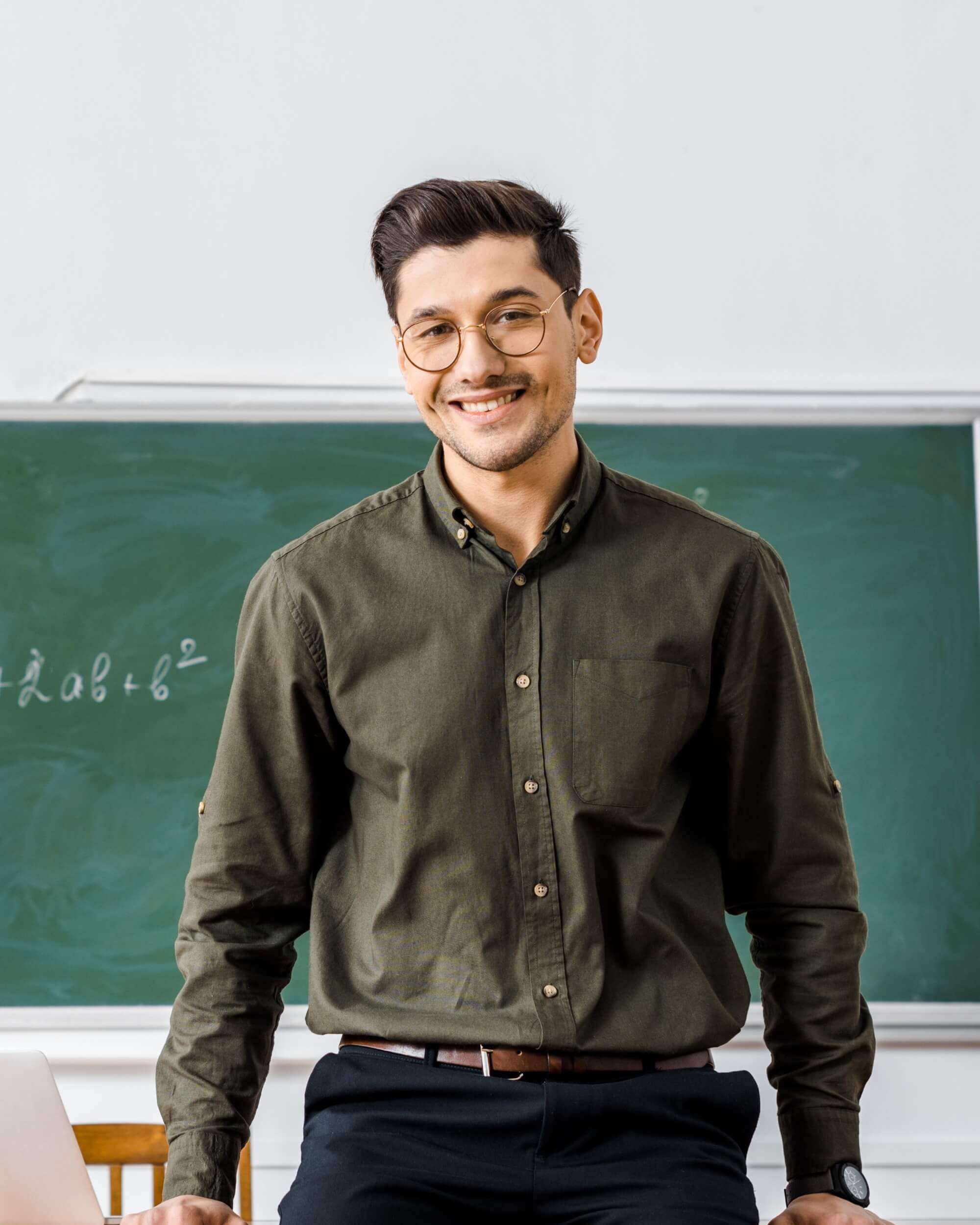 Smiling Male Teacher In Formal Wear Looking At Cam 2024 11 18 04 20 10 Utc